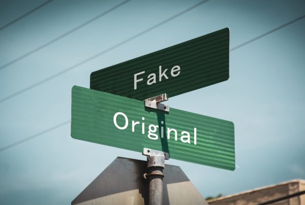 Street Sign the Direction Way to Original versus Fake